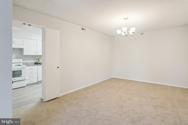 15115 Interlachen Dr Unit 3-415, Silver Spring, MD 20906 - unfurnished room featuring light carpet and a chandelier