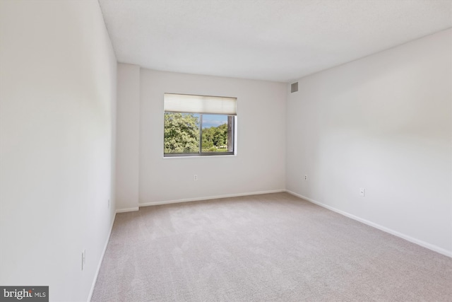 15115 Interlachen Dr Unit 3-415, Silver Spring, MD 20906 - unfurnished room featuring carpet floors and baseboards