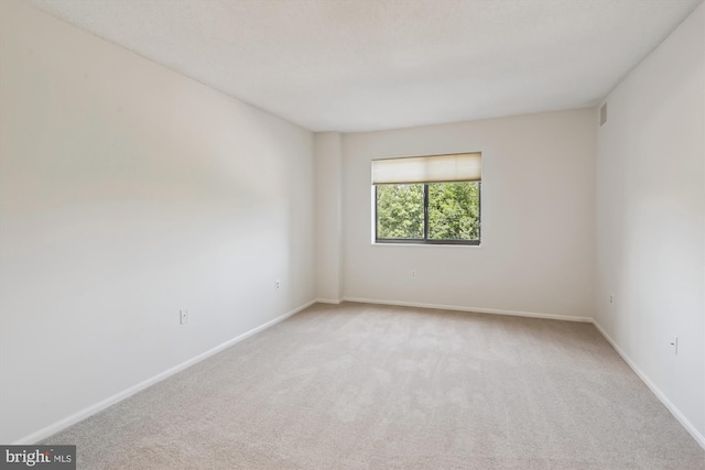 15115 Interlachen Dr Unit 3-415, Silver Spring, MD 20906 - empty room featuring light colored carpet