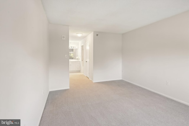 15115 Interlachen Dr Unit 3-415, Silver Spring, MD 20906 - spare room featuring light carpet and baseboards