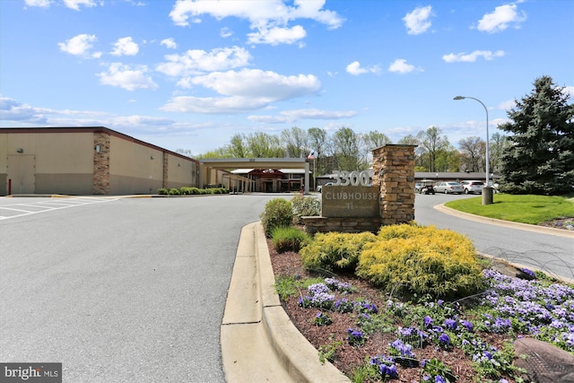 15115 Interlachen Dr Unit 3-415, Silver Spring, MD 20906 - view of asphalt street featuring street lights and curbs