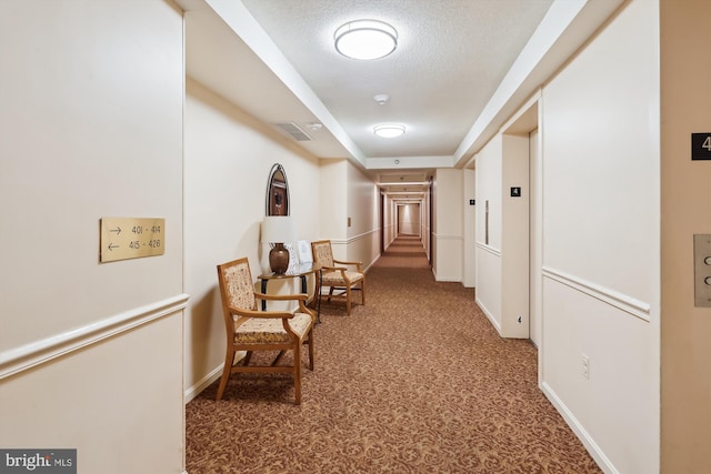 15115 Interlachen Dr Unit 3-415, Silver Spring, MD 20906 - hallway featuring carpet and a textured ceiling