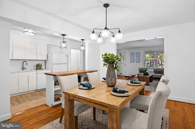 3718 Yolando Rd, Baltimore, MD 21218 - dining space featuring light wood-style flooring
