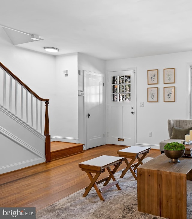 3718 Yolando Rd, Baltimore, MD 21218 - living room featuring stairway and wood finished floors
