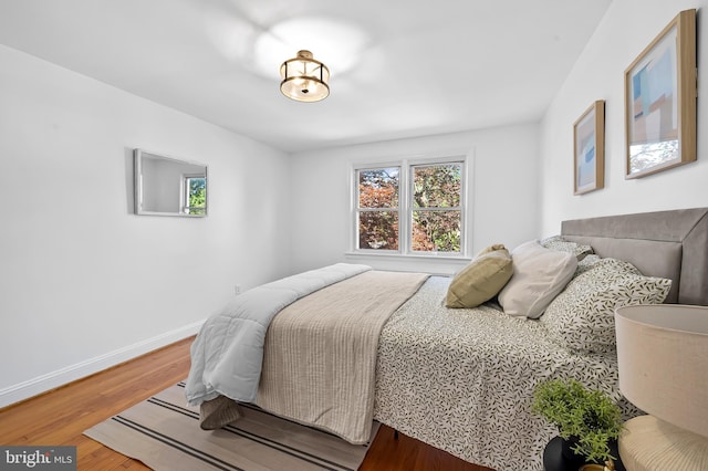 3718 Yolando Rd, Baltimore, MD 21218 - bedroom featuring wood finished floors and baseboards
