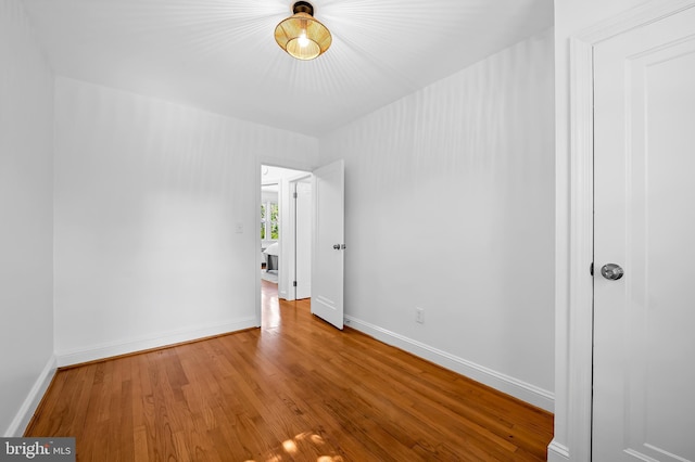 3718 Yolando Rd, Baltimore, MD 21218 - spare room featuring wood finished floors and baseboards