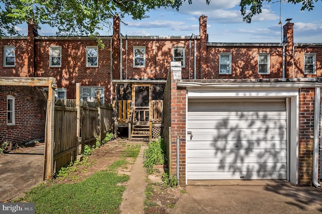 3718 Yolando Rd, Baltimore, MD 21218 - multi unit property featuring brick siding, concrete driveway, and a garage