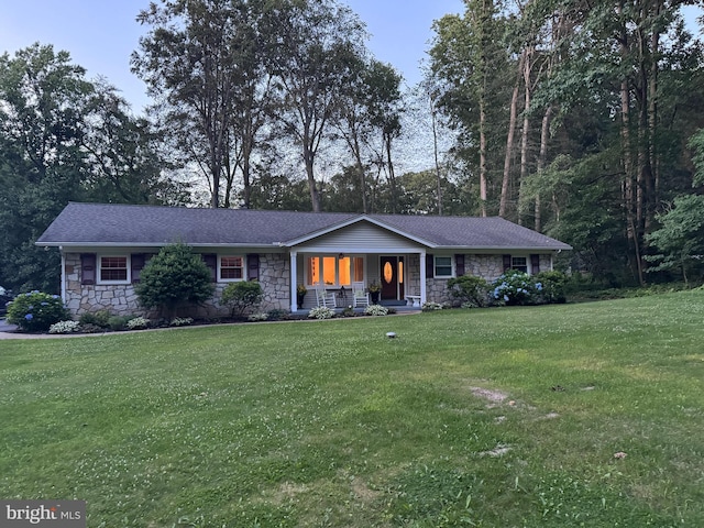 451 E Lafayette Dr, West Chester, PA 19382 - single story home with stone siding, a porch, and a front lawn