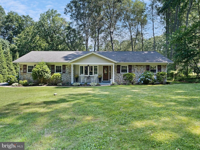 451 E Lafayette Dr, West Chester, PA 19382 - ranch-style house featuring stone siding, a porch, a front lawn, and roof with shingles