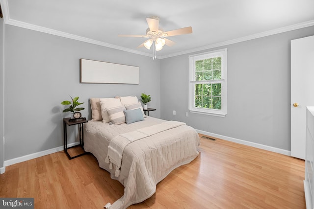 10110 Sassafras Woods Ct, Burke, VA 22015 - bedroom featuring light wood-style floors, ornamental molding, and ceiling fan