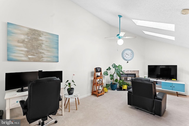 6900 Mary Caroline Cir Unit L, Alexandria, VA 22310 - office space with a glass covered fireplace, a skylight, carpet flooring, ceiling fan, and high vaulted ceiling