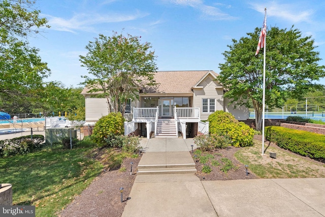 6900 Mary Caroline Cir Unit L, Alexandria, VA 22310 - view of front facade with stairs and a shingled roof