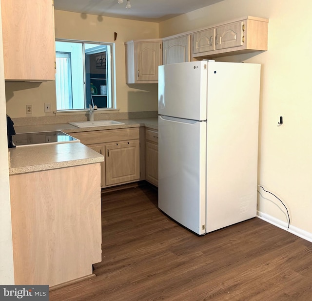768D Hudson Pkwy, Manchester Twp, NJ 08759 - kitchen featuring freestanding refrigerator, dark wood-style floors, light brown cabinetry, stovetop, and light countertops