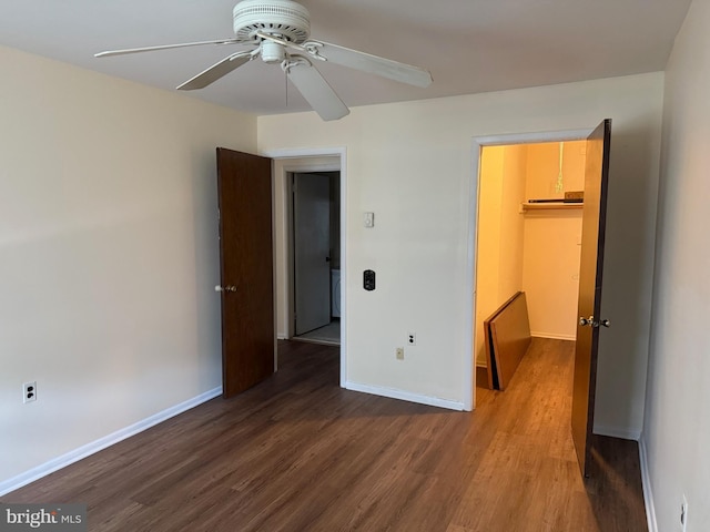 768D Hudson Pkwy, Manchester Twp, NJ 08759 - unfurnished bedroom with a walk in closet, wood finished floors, a closet, and a ceiling fan
