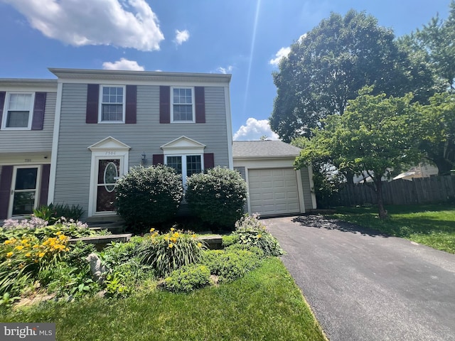 7506 Filbert Ter, Gaithersburg, MD 20879 - view of front of home featuring asphalt driveway and a garage
