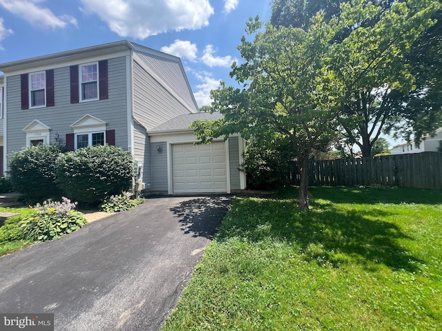 7506 Filbert Ter, Gaithersburg, MD 20879 - view of front of house featuring asphalt driveway and an attached garage