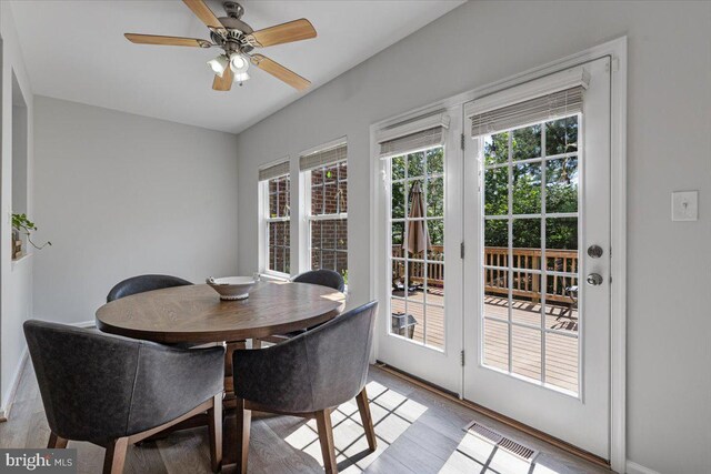 12749 Stone Lined Cir, Woodbridge, VA 22192 - dining room featuring wood finished floors and a ceiling fan