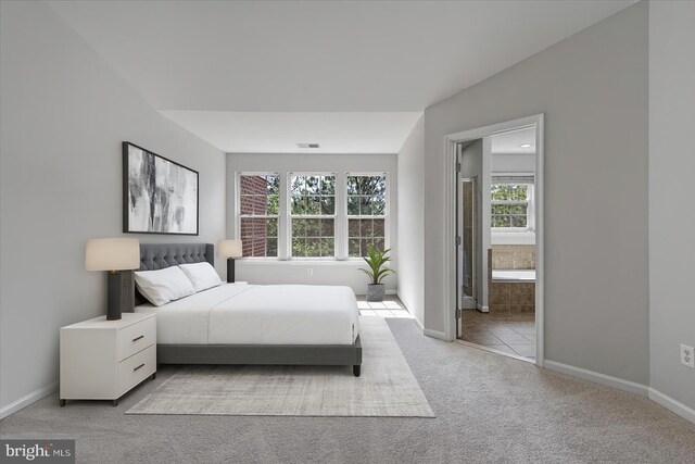 12749 Stone Lined Cir, Woodbridge, VA 22192 - carpeted bedroom with baseboards and ensuite bathroom