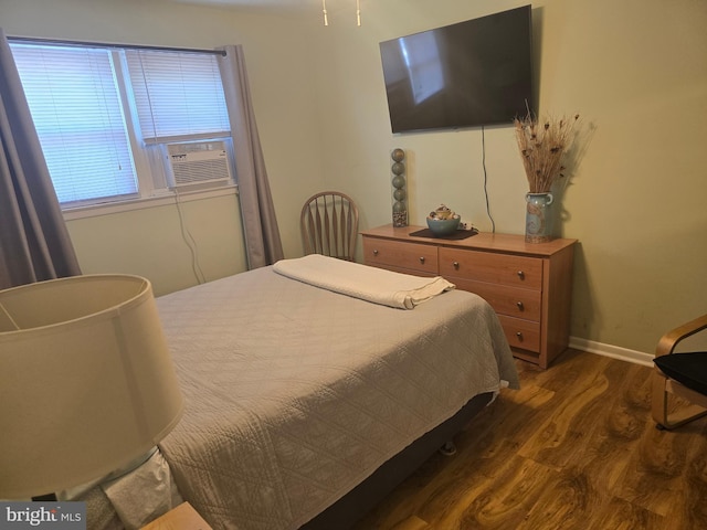 1203 Beach Ave E Unit 8, Brigantine, NJ 08203 - bedroom with wood finished floors and cooling unit