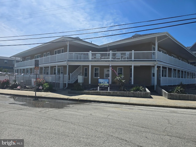1203 Beach Ave E Unit 8, Brigantine, NJ 08203 - view of front facade featuring stairs