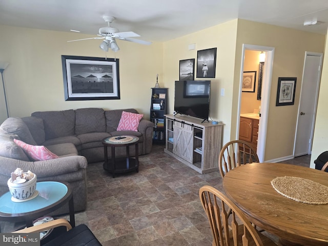 1203 Beach Ave E Unit 8, Brigantine, NJ 08203 - living room with stone finish floors and a ceiling fan