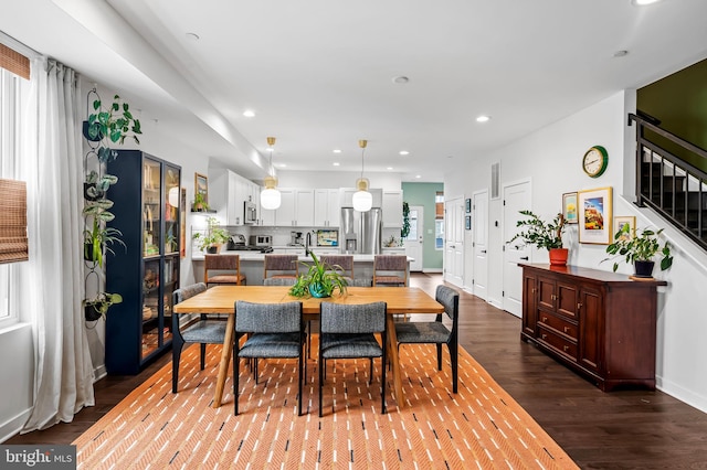 1309 Old Coldspring Ln W, Baltimore, MD 21211 - dining area featuring recessed lighting, stairway, and dark wood-type flooring