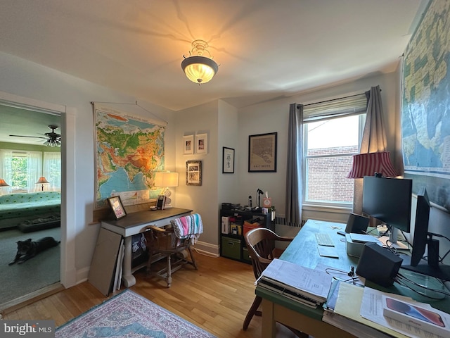 5512 Sefton Ave, Baltimore, MD 21214 - office area with light wood-style floors and healthy amount of natural light