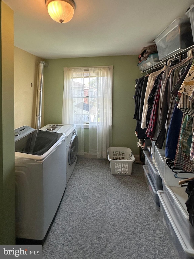 5512 Sefton Ave, Baltimore, MD 21214 - washroom with washer and clothes dryer and carpet
