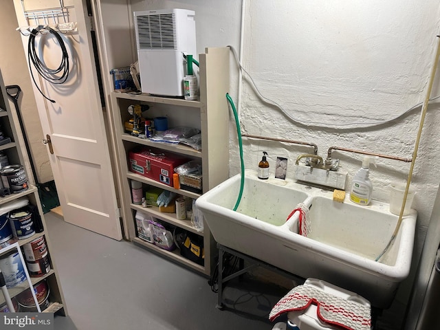 5512 Sefton Ave, Baltimore, MD 21214 - washroom featuring heating unit and a sink