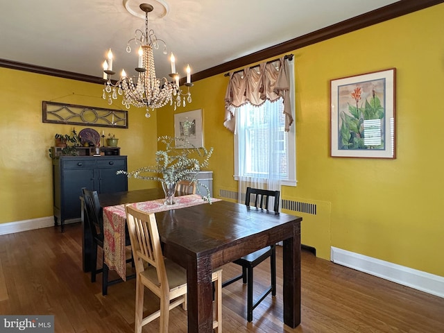 5512 Sefton Ave, Baltimore, MD 21214 - dining space featuring crown molding, wood finished floors, and a chandelier