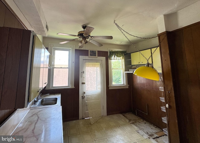 2805 Oakley Ave, Baltimore, MD 21215 - kitchen with plenty of natural light, a ceiling fan, and light countertops