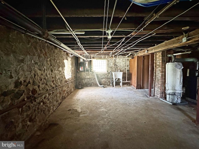 2805 Oakley Ave, Baltimore, MD 21215 - basement featuring water heater and a sink