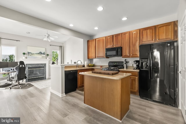 33 S Cummings Dr, Middletown, DE 19709 - kitchen featuring black appliances, recessed lighting, healthy amount of natural light, and light wood-style flooring