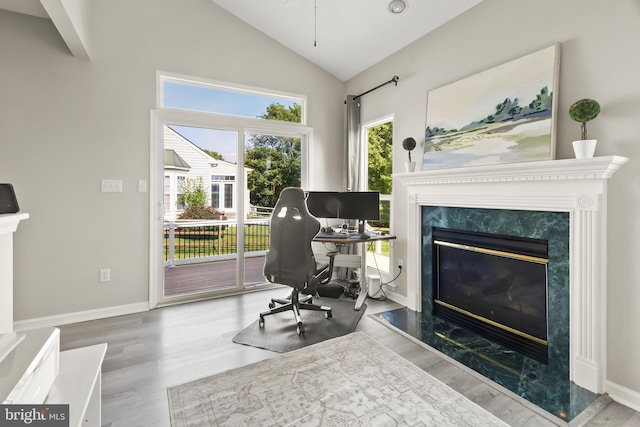 33 S Cummings Dr, Middletown, DE 19709 - office space with a fireplace, wood finished floors, and lofted ceiling