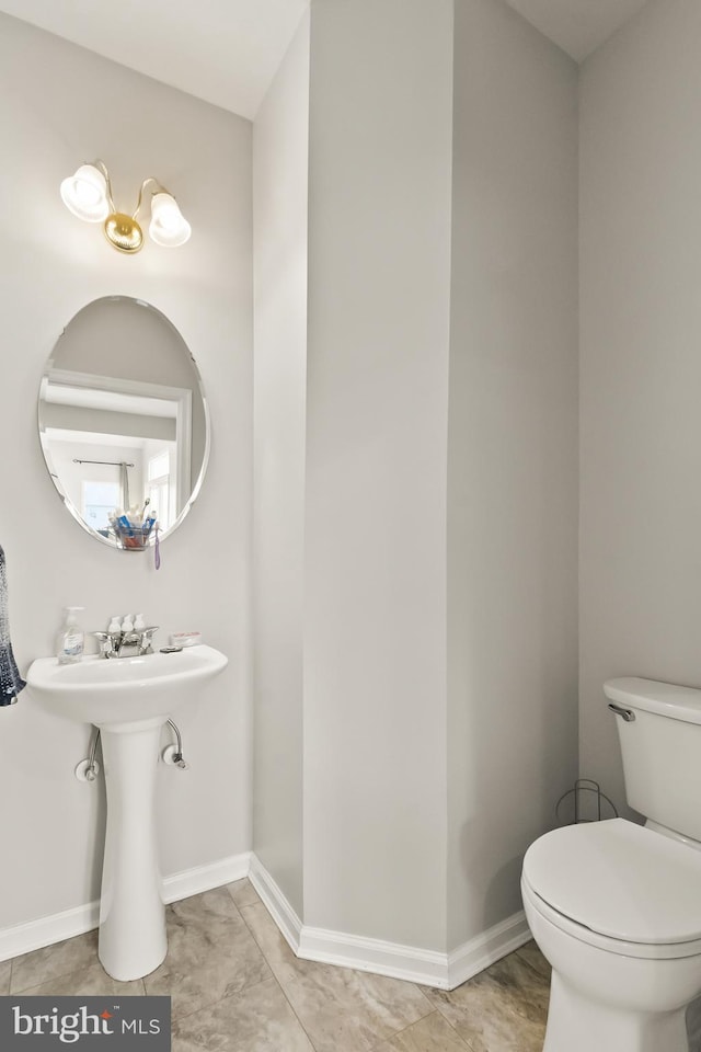33 S Cummings Dr, Middletown, DE 19709 - bathroom featuring toilet and baseboards