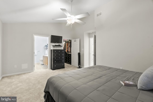 33 S Cummings Dr, Middletown, DE 19709 - bedroom with light carpet, a spacious closet, a closet, ensuite bathroom, and a ceiling fan