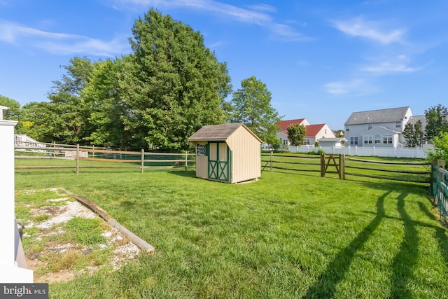 33 S Cummings Dr, Middletown, DE 19709 - fenced backyard with a storage shed