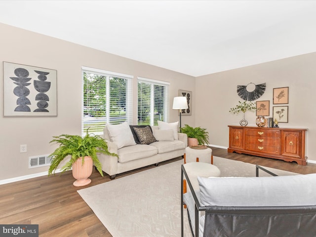 12004 Cheyenne Rd, Gaithersburg, MD 20878 - living area with baseboards and wood finished floors
