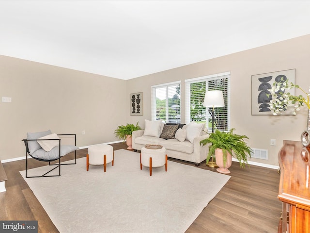 12004 Cheyenne Rd, Gaithersburg, MD 20878 - living room with baseboards and wood finished floors
