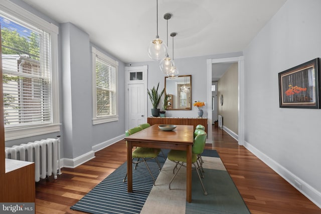 3301 Beech Ave, Baltimore, MD 21211 - dining space featuring radiator and wood finished floors
