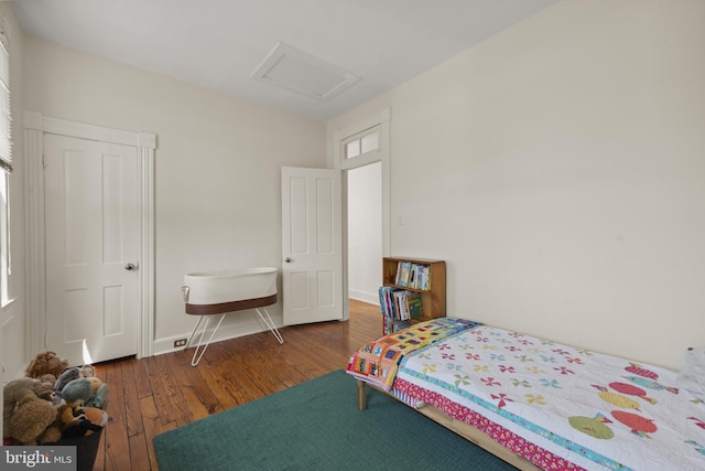 3301 Beech Ave, Baltimore, MD 21211 - bedroom featuring attic access and wood finished floors