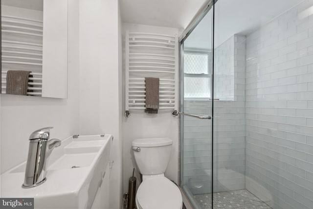 3301 Beech Ave, Baltimore, MD 21211 - full bath with radiator, a towel warmer, and a shower stall