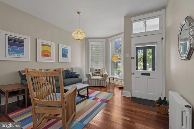 3301 Beech Ave, Baltimore, MD 21211 - entryway featuring radiator heating unit and dark wood-style flooring