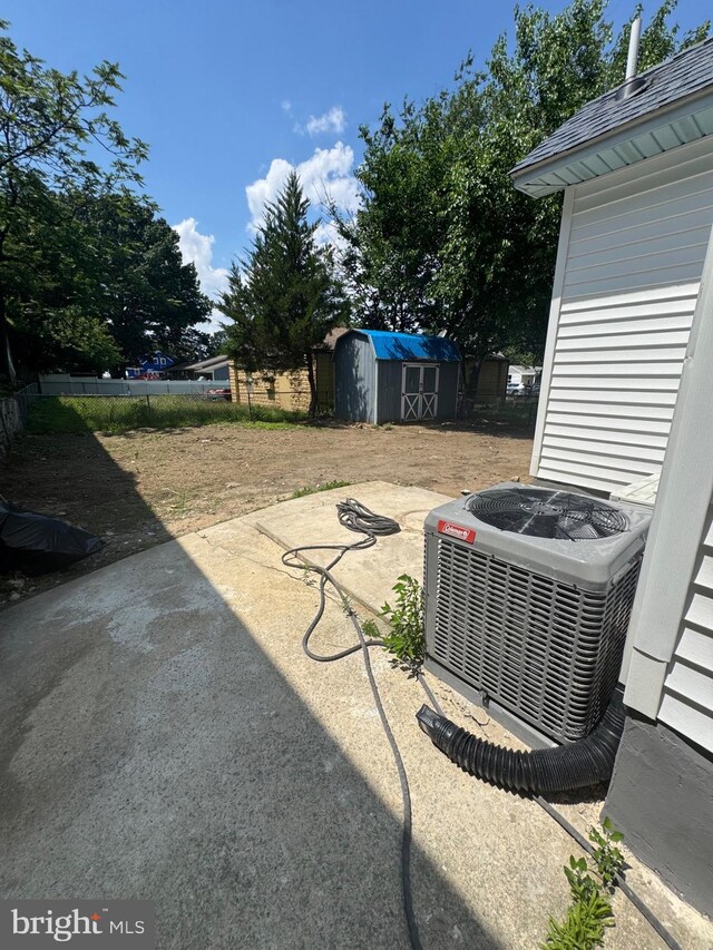 3 N Grove Ave, National Park, NJ 08063 - view of yard featuring a storage unit and a patio area