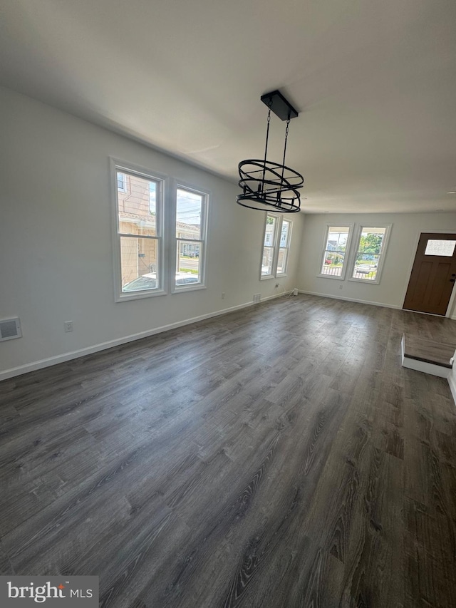 3 N Grove Ave, National Park, NJ 08063 - unfurnished dining area featuring a chandelier and dark wood finished floors