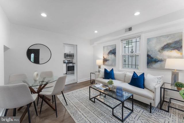 4621 A St SE, Washington, DC 20019 - living room featuring wood finished floors and recessed lighting
