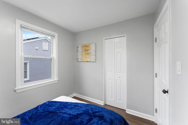 4621 A St SE, Washington, DC 20019 - bedroom featuring dark wood-style floors and a closet