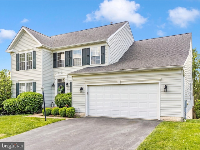 1402 Marian Way, Mount Airy, MD 21771 - view of front facade with asphalt driveway, roof with shingles, and a front lawn