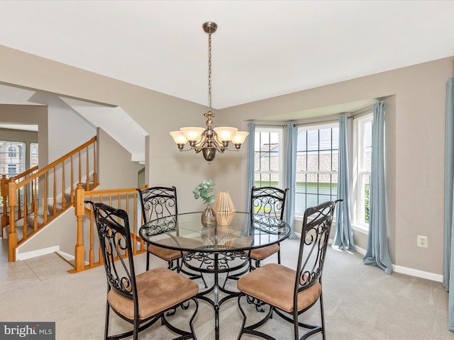 1402 Marian Way, Mount Airy, MD 21771 - dining area with a chandelier, light carpet, and stairs