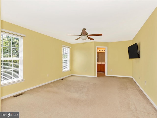 1402 Marian Way, Mount Airy, MD 21771 - empty room with plenty of natural light, light carpet, and ceiling fan